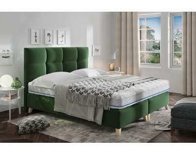 Zielone łóżko tapicerowane MONA Comforteo